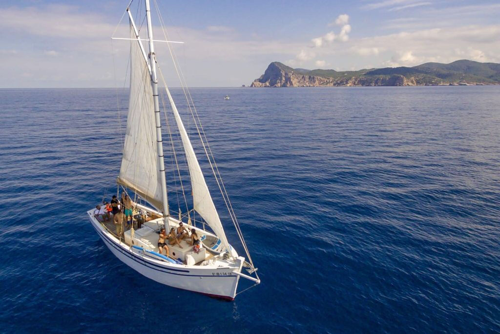 Ibiza: Private Sailboat with Premium Open Bar, Food and Music