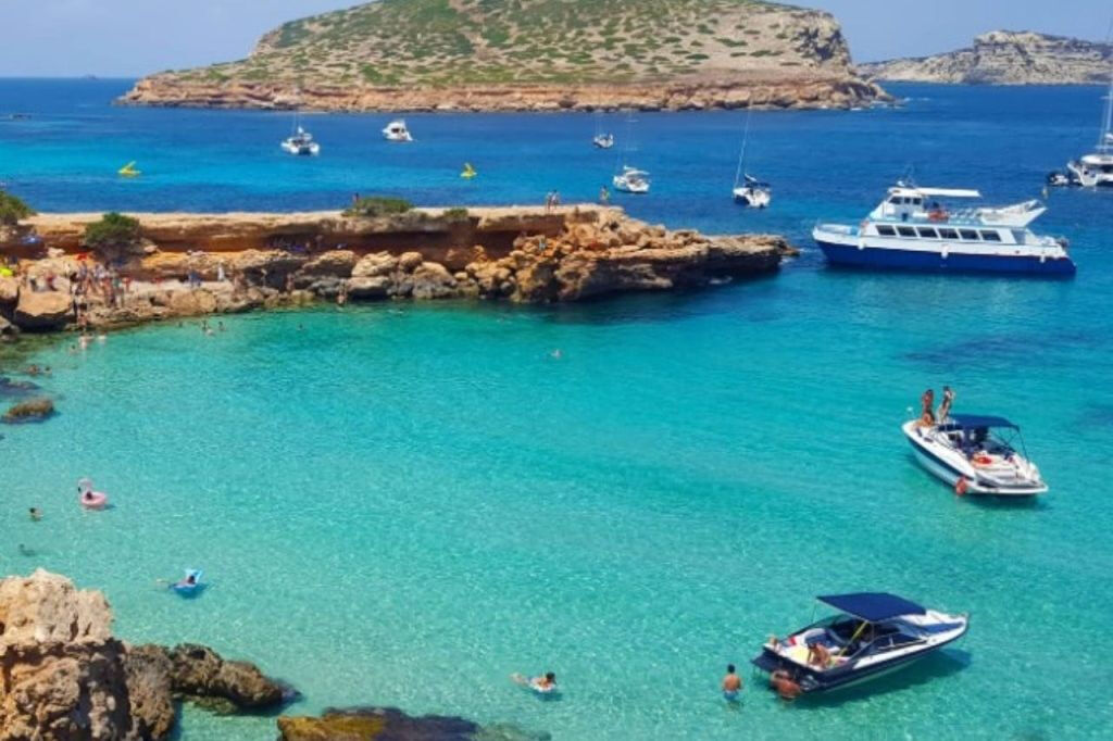 Ibiza: Boat Trip with Banana Boat, Food & Premium Open Bar