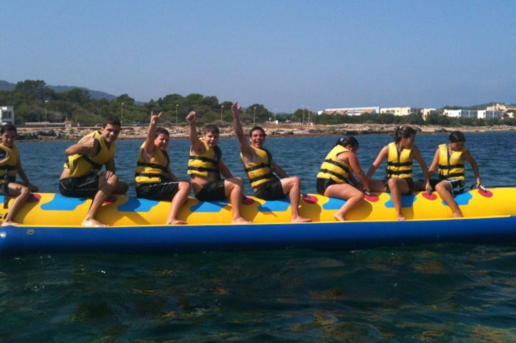 Ibiza: Boat Trip with Banana Boat, Food & Premium Open Bar
