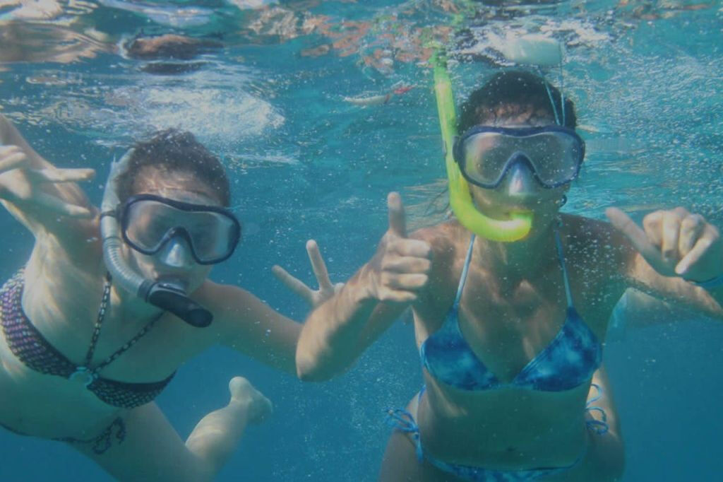 Ibiza: Boat Trip with Banana Boat, Food & Premium Open Bar