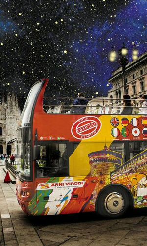 Milano: Tour notturno in autobus scoperto + guida audio